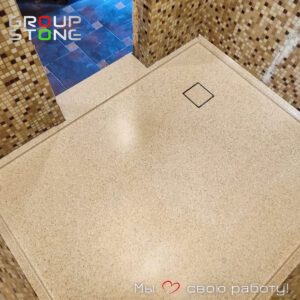 Элегантность и надежность: индивидуальные душевые поддоны из искусственного камня